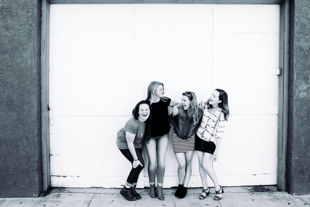 Grayscale Photography of Four Women Wearing Clothes