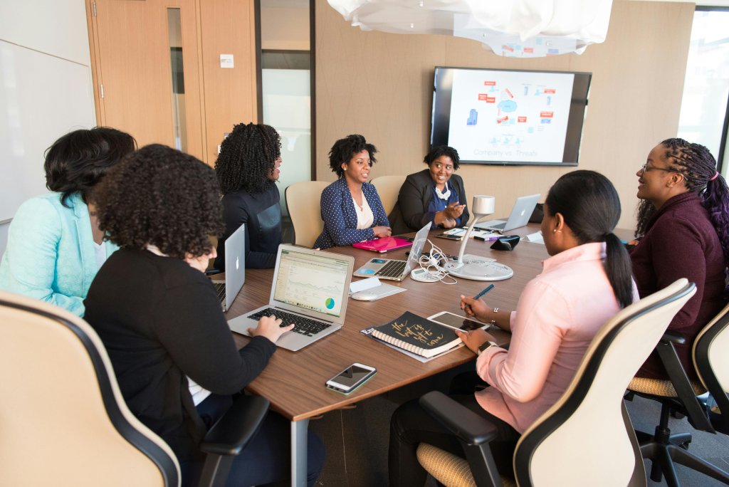 Employees having a Board Meeting