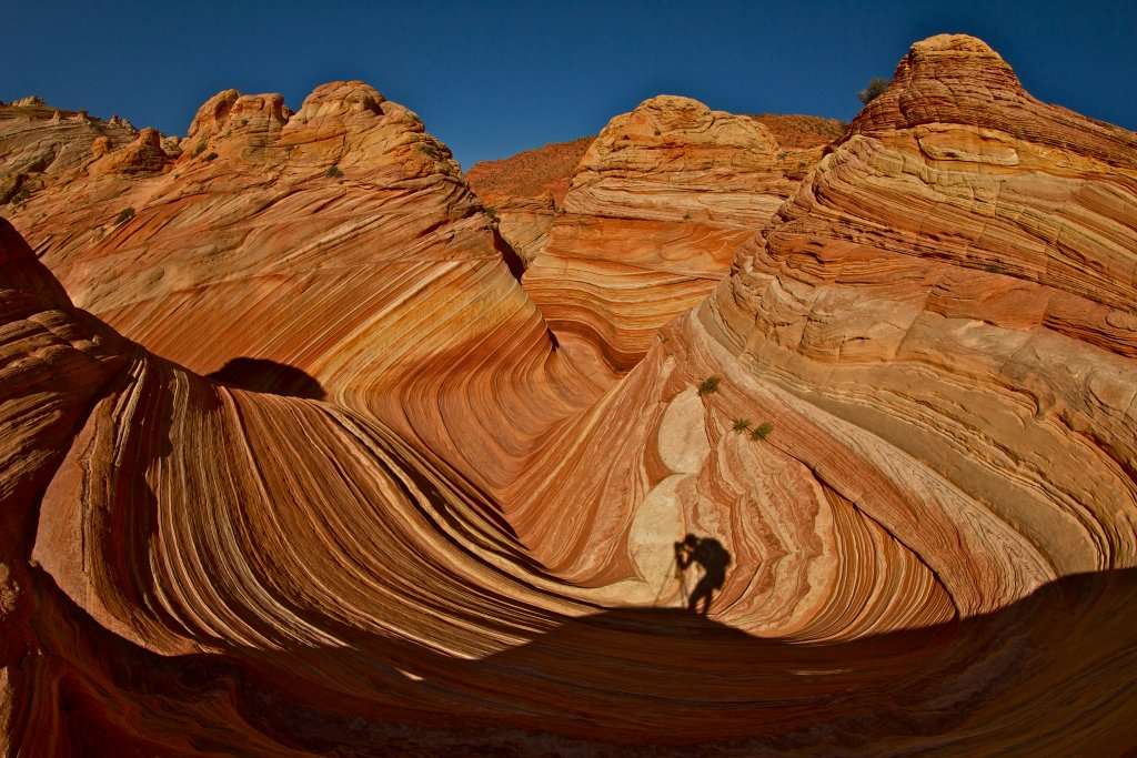 Photographer Shadow on Arid, Barren Rocks